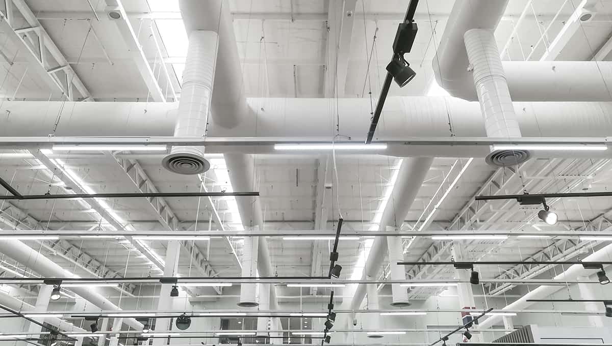 Pipeline and lighting above the ceiling of supermarket store
